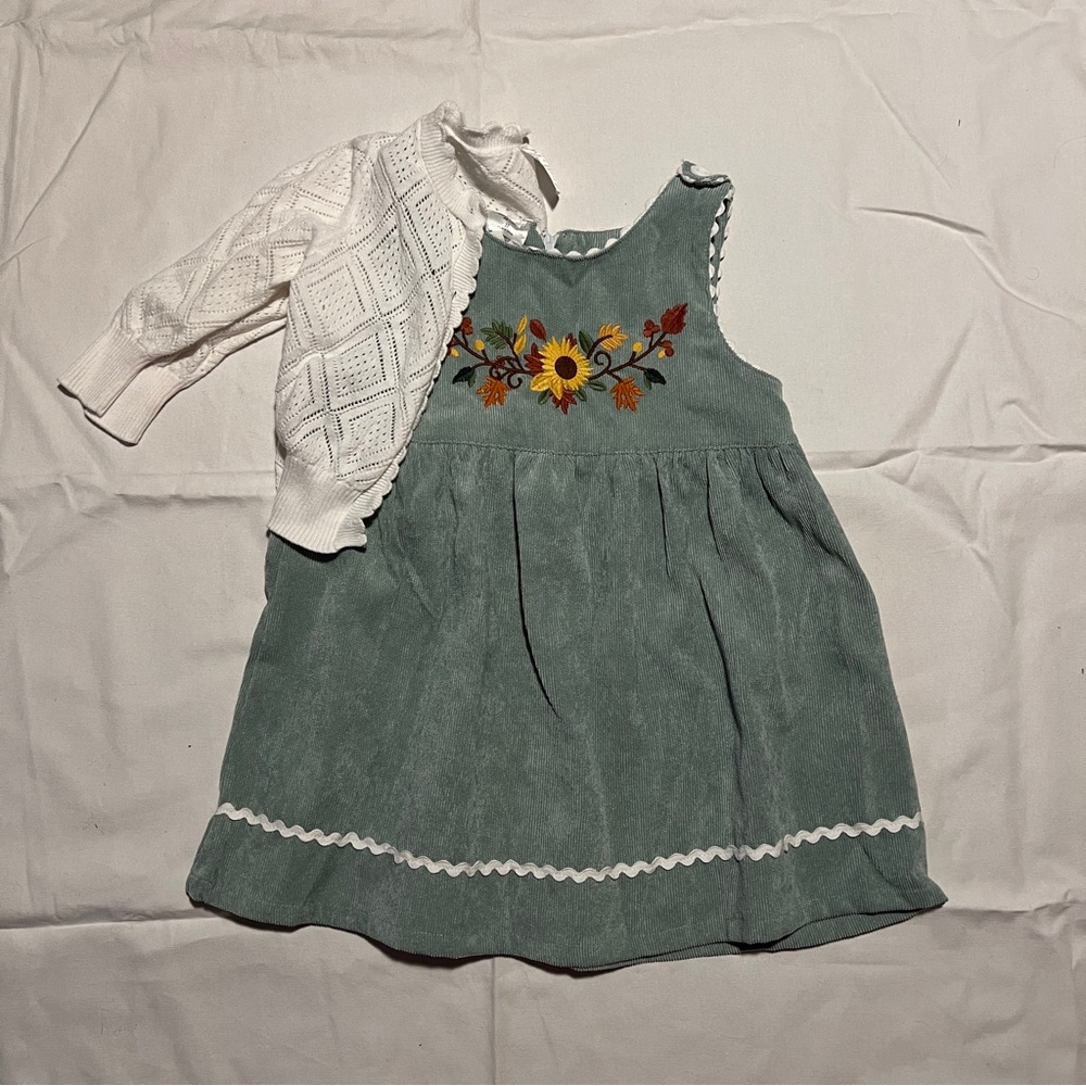 Blue corduroy dress with sunflower embroidery